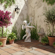 Baroque cherub statue with ornate wings and flowing drapery, holding a torch in a classical old world European style pose. Side Angle
