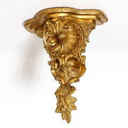 Baroque wall bracket with ornate scrollwork, acanthus leaves, and shell motif in old world European classical style.