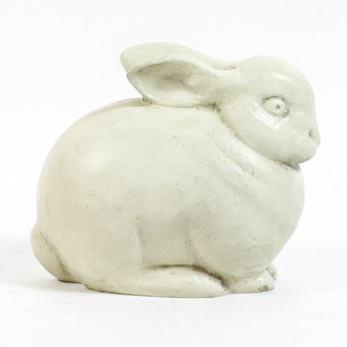 Sculpted rabbit figurine with rounded form and subtle detailing, inspired by old world European and classical garden statuary. Side View