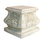 Ornate square pedestal with classical Baroque detailing, featuring shell motifs and intricate scrollwork in old world European style.