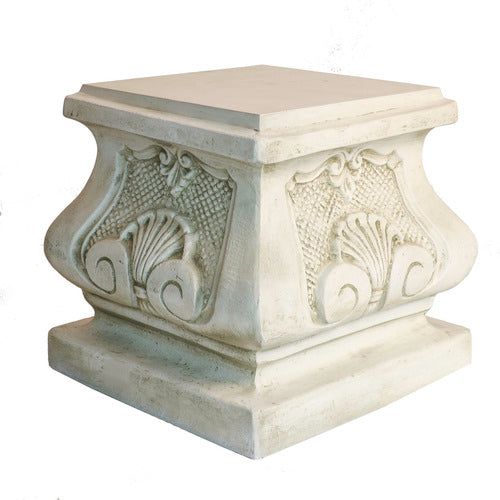 Ornate square pedestal with classical Baroque detailing, featuring shell motifs and intricate scrollwork in old world European style.