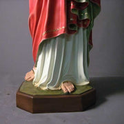 Sacred Heart of Jesus statue in classical Renaissance style, featuring ornate robes and detailed facial expression, standing on a pedestal. Different Angle