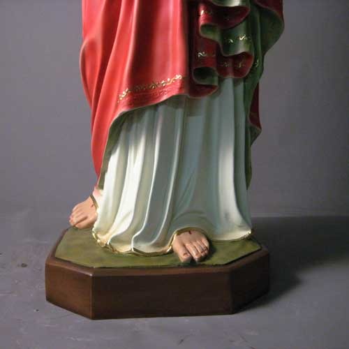 Sacred Heart of Jesus statue in classical Renaissance style, featuring ornate robes and detailed facial expression, standing on a pedestal. Different Angle