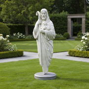 Shepherd statue in classical old world European style, holding a lamb and staff, featuring flowing robes and serene facial expression. Side Angle