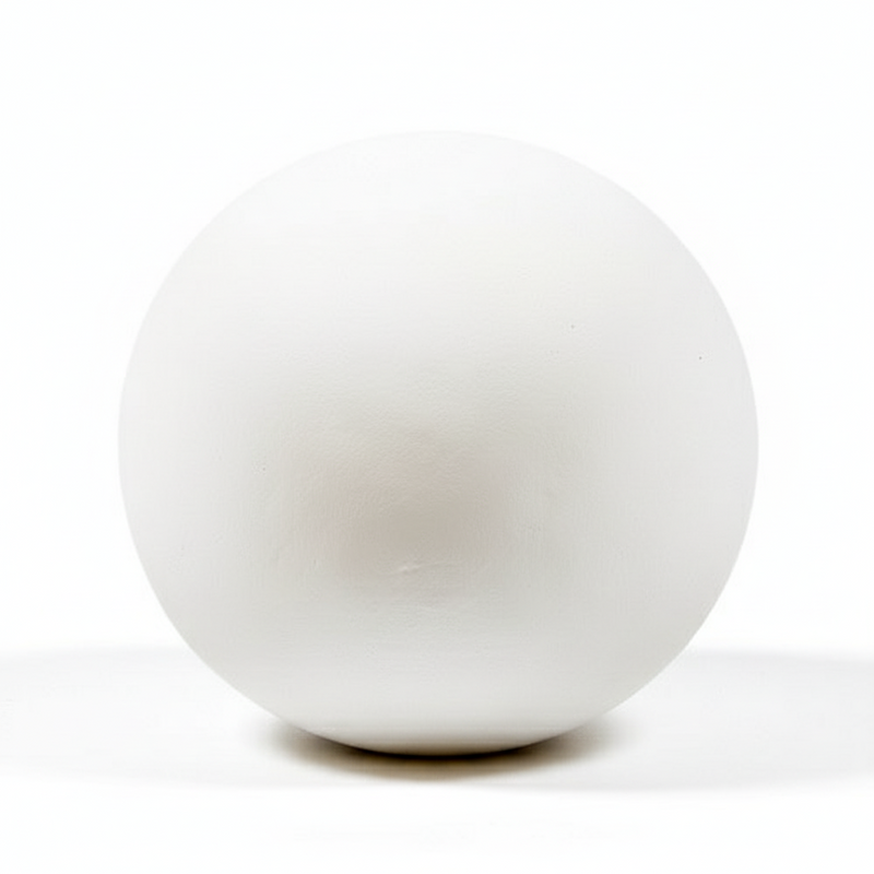 Sculpted sphere with smooth, minimalist surface, inspired by classical and old world European geometric forms.