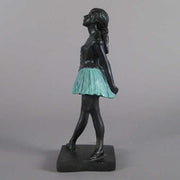 Ballet dancer figurine in classical pose with an ornate, old world European style and Renaissance-inspired detailing. Side Angle
