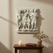 Bas-relief of Renaissance cherubs with musical instruments, featuring ornate classical detailing and expressive, lifelike figures. Side Angle