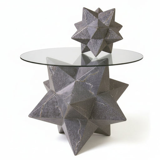 Star-shaped geometric table base with glass top, featuring ornate, old world European and classical design elements.