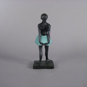 Ballet dancer figurine in classical pose with an ornate, old world European style and Renaissance-inspired detailing. Different Angle