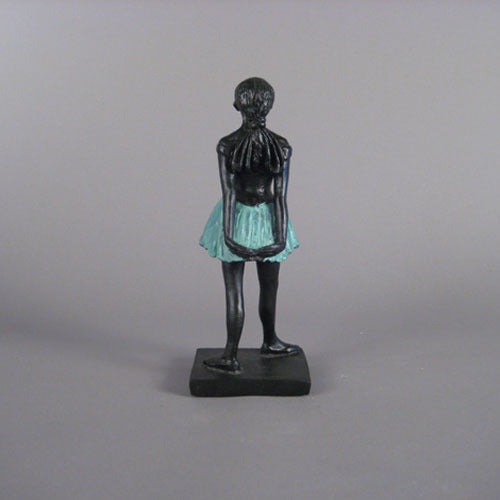 Ballet dancer figurine in classical pose with an ornate, old world European style and Renaissance-inspired detailing. Different Angle