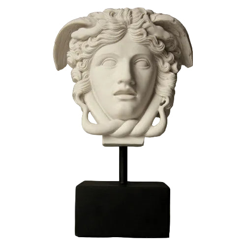 Medusa head sculpture with classical Greek and ornate Baroque details, featuring serpentine hair and dramatic facial expression.