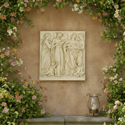 Bas-relief of classical figures in flowing robes playing lutes, surrounded by cherubs, in an ornate Renaissance style. Side Angle