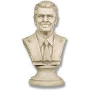 Classical-style bust of a distinguished man in a suit and tie with detailed facial features and an ornate pedestal base.