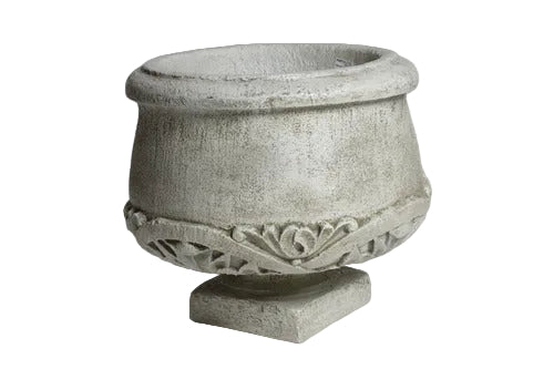 Ornate old world European planter with classical carved scrollwork and pedestal base, featuring a rounded bowl shape.