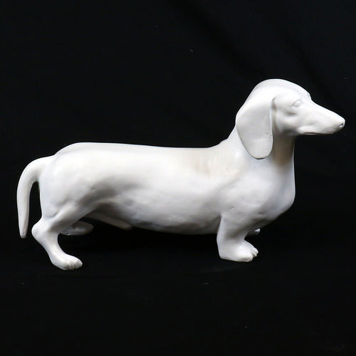 Dachshund figurine with smooth, classical lines and subtle old world European sculptural details Side View