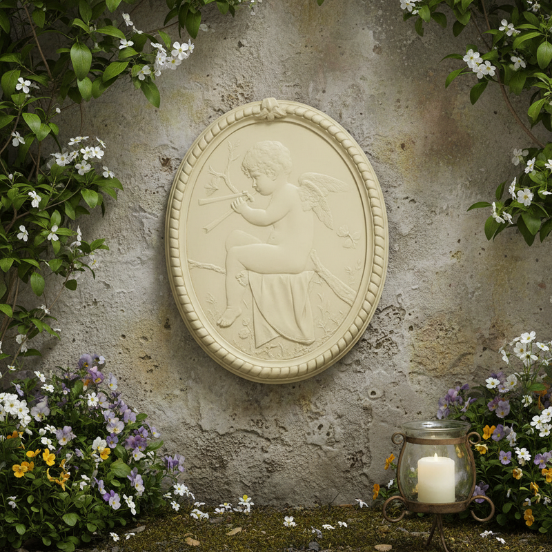 Cherub relief in classical Baroque style, seated with a flute, surrounded by ornate oval frame and intricate detailing. Side Angle