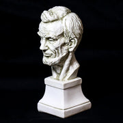 Classical bust sculpture with detailed facial features and beard, set on a square pedestal in Renaissance-inspired style. Side View