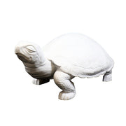 Tortoise sculpture with ornate, classical detailing and old world European style, featuring textured shell and lifelike posture.