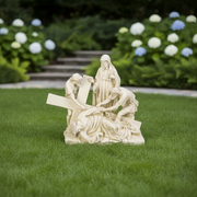 Baroque-style sculpture depicting a classical biblical scene with three figures aiding a fallen Christ carrying a cross. Side View