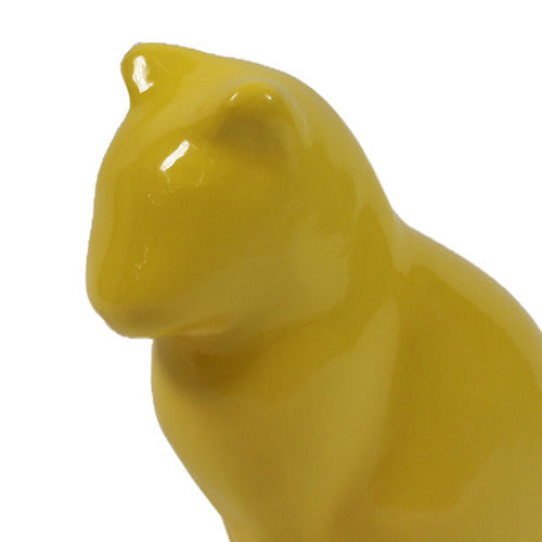 Cat figurine with smooth, minimalist lines and a stylized, classical form inspired by old world European sculpture. Other Angle