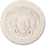 Medusa head relief with flowing serpentine hair, surrounded by a Greek key border in classical old world European style.