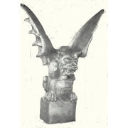 Gothic gargoyle statue with large outstretched wings, fierce expression, and ornate medieval detailing on a pedestal base.