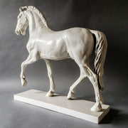 Classical European horse statue with ornate detailing, Renaissance-inspired pose, and elegant, lifelike musculature on a rectangular base. Different Angle