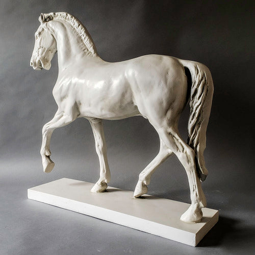 Classical European horse statue with ornate detailing, Renaissance-inspired pose, and elegant, lifelike musculature on a rectangular base. Different Angle