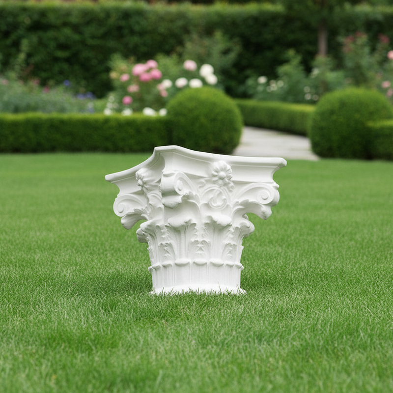 Corinthian column capital with ornate acanthus leaves, scrolls, and classical floral motifs in old world European style. Side Angle