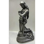 Kneeling medieval knight in ornate armor, hands clasped in prayer, classical old world European style with Gothic detailing. Side View