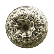 Ornate round medallion with intricate Baroque floral motifs and classical old world European detailing in symmetrical relief.
