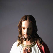 Sacred Heart of Jesus statue in classical Renaissance style, featuring ornate robes and detailed facial expression, standing on a pedestal. Other Angle