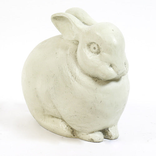 Sculpted rabbit figurine with rounded form and subtle detailing, inspired by old world European and classical garden statuary.