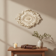 Ornate Baroque ceiling medallion with intricate floral scrollwork and classical old world European detailing. Side View