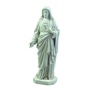 Sacred Heart of Jesus statue in classical old world European style with flowing robes and ornate detailing, standing on a pedestal.