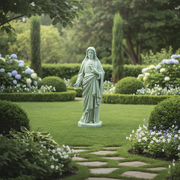 Sacred Heart of Jesus statue in classical old world European style with flowing robes and ornate detailing, standing on a pedestal. Side View
