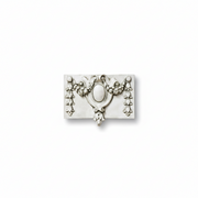 Ornate Baroque-style wall plaque with central oval medallion, floral garlands, and classical scrollwork detailing.