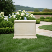 Classical pedestal with clean lines, stepped base, and subtle old world European architectural detailing. Side Angle