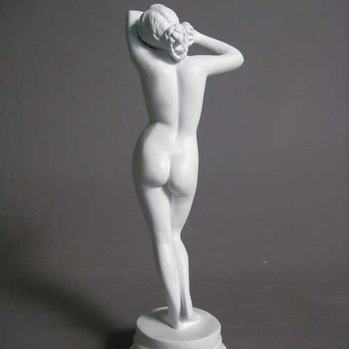 Classical female torso sculpture with raised arms, inspired by Renaissance and Greek art, featuring smooth, elegant contours. Side Angle