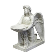 Kneeling angel with a serene facial expression and feathered wings, holding a large open shell bowl on a rectangular base.