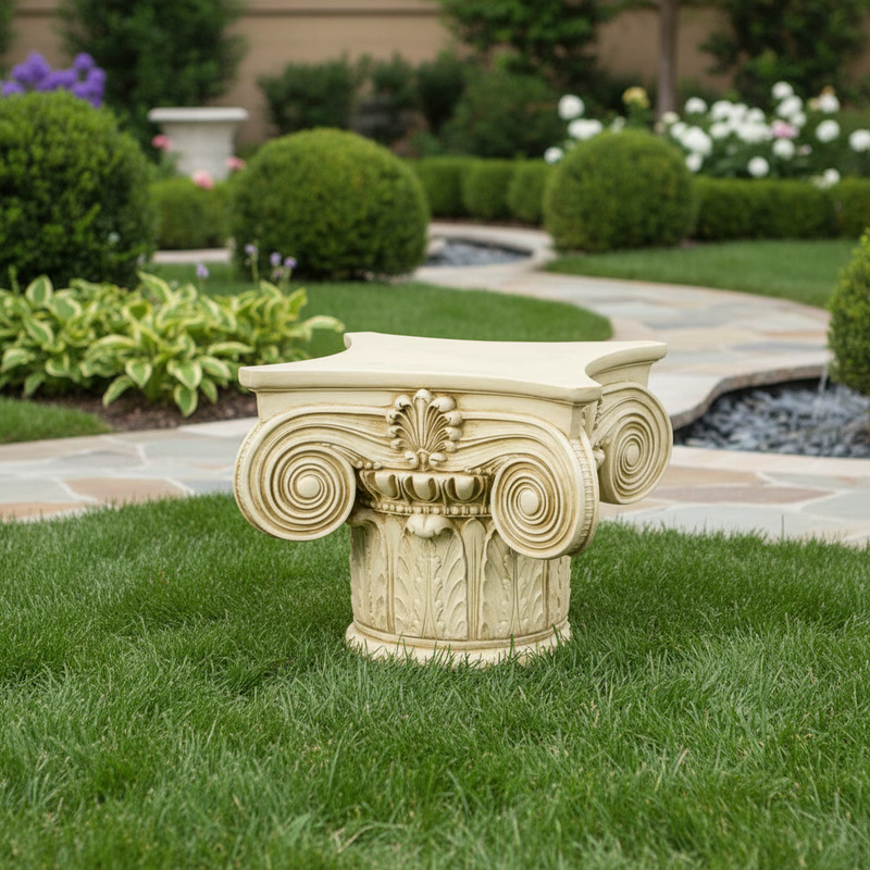 Classical Greek Ionic column capital with ornate volutes, acanthus leaf detailing, and symmetrical old world European design. Side Angle