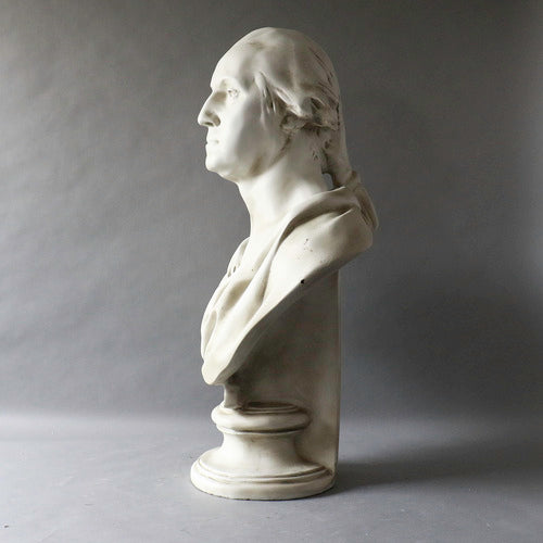 Classical bust sculpture with draped robes, inspired by old world European and Renaissance styles, featuring detailed, lifelike features. Side Angle
