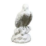 Eagle sculpture perched on rocky base, featuring classical old world European and Renaissance-inspired ornate detailing.