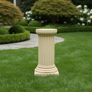 Classical Greek fluted column pedestal with ornate base and capital, featuring old world European architectural style. Side Angle
