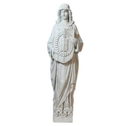 Medieval European knight statue holding an ornate shield, featuring classical and Gothic detailing with intricate carved patterns.
