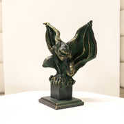 Gothic gargoyle statue with outstretched wings and crouching pose on a square pedestal, featuring ornate medieval detailing. Other Angle