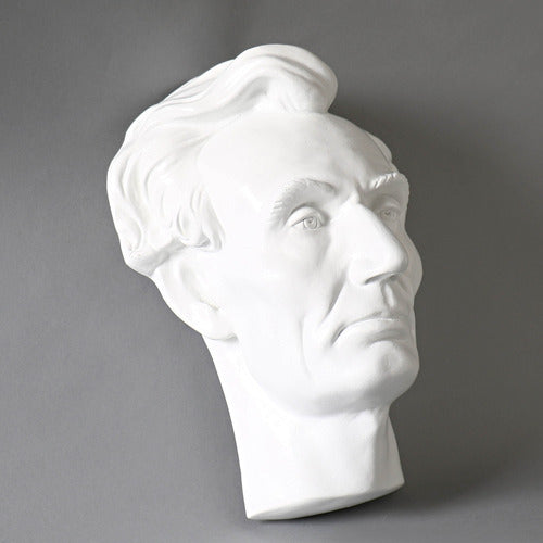 Classical bust sculpture with detailed facial features and stylized hair, inspired by Renaissance and old world European artistry Side View