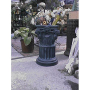 Classical pedestal with ornate lion head details and fluted column, inspired by old world European and Renaissance architectural styles Side View