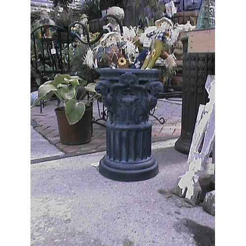 Classical pedestal with ornate lion head details and fluted column, inspired by old world European and Renaissance architectural styles Side View