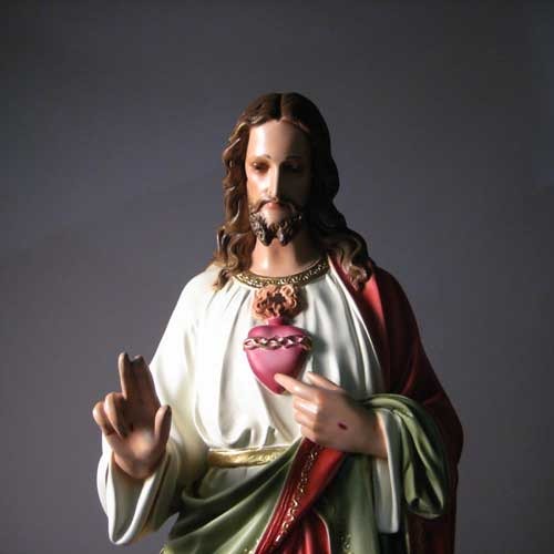 Sacred Heart of Jesus statue in classical Renaissance style, featuring ornate robes and detailed facial expression, standing on a pedestal. Additional Angle